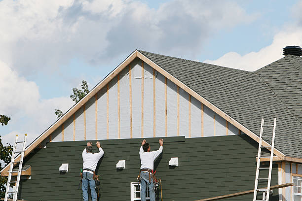 Professional Storm Damage Siding Repair technician working in Cassville, PA